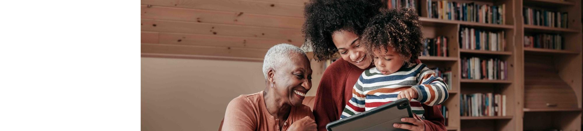 family looking at tablet